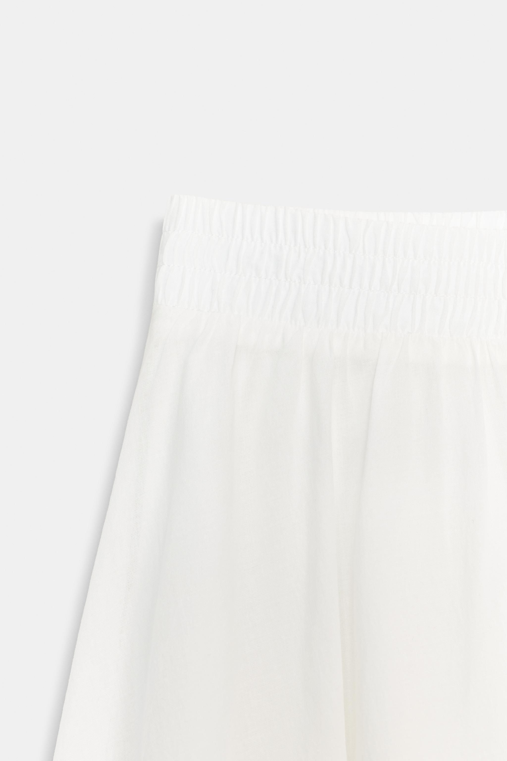 JUPE MI-LONGUE CAPE